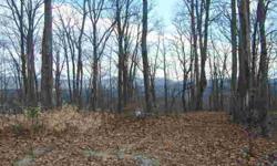 PRICE REDUCED -- Beautiful 3.57 acre lot in gated, private mountain home community of Grants Mountain -- Fantastic Views -- Some Clearing -- Well Already In Place (saving you thousands) on your new home price -- This subdivision is close to town and has