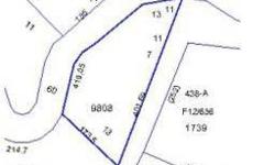 -This large wooded lot has potential views with a good building site. Location of lot provides good privacy with convenience of equal access to all three Connestee Falls Gates.Listing originally posted at http