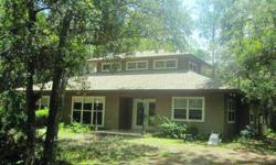 Welcome to Fenny Bosk Woodland. This beautiful Old Florida property is fabulous. The 3 bedroom 2 bath home has 20' ceiling in the living area w/FL Passive Solar windows. New roof in 2011, screened addition in 2000A/C compressor replaced in 2006. New