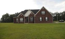 A custom built home with 4brms, 3.5bths, formal dining room, large great room, office, rec room, and much more. This home is situated on 3.7 acres and has a nice detached building for storing lawnmowers or tractors. There is a 3 car garage that has a half