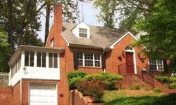 Retro elegance; walk to hip downtown, overlook Forest Hills Park. Delightful sunroom with woodstove. Family room with fireplace, arched entry to formal dining room. Large eat-in litchen. Master up or down, 2 bedrooms on main floor and 2 upstairs. 14x7