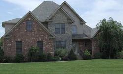 Just 1 minute from I-64 in beautiful Silver Creek Subdivision, this 5 bedroom 3.5 bath home boasts over 4400 square feet of total living space. This upscale brick and stone home features Brazilian Cherry floors throughout most of the main level. There is