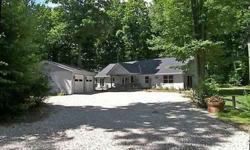 A wildlife lovers paradise! 40 acres of hardwoods in western Benzie County?s Platte Township with a very well built and nicely appointed home. Built in 2006 and shows like new, this smart ranch style plan boasts Kitchen Aid kitchen appliances, central vac