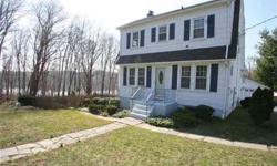 Lovely updated Dutch Colonial with gorgeous reservoir views. Features include hardwood floors throughout, crown molding, new eat-in-kitchen w/granite counters and stainless steel appliances, wine refrigerator, double oven. Fieldstone fireplace in living