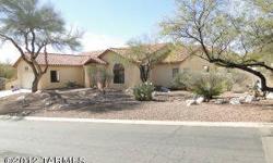 GREAT COMMUNITY IN THE HEART OF THE CATALINA FOOTHILLS JUST WEST OF VENTANA CANYON, CLOSE TO RESORT GOLF COURSE. CONTEMPORARY HOME WITH HIGH CEILINGS AND OPEN FLOOR PLAN WITH LARGE GREAT ROOM, PICTURE WINDOWS ALONG BACK TO 10X60 COVERED PATIO. SECLUDED