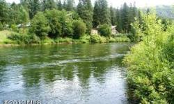 2.5 level acres of Icicle River frontage with immaculate mountain view. There is an older 2 bedroom, 1 bath home with a large shop. Live here or bring your plans and build your dream home here. Wood furnace in basement.Listing originally posted at http