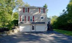 Tucked gently behind a slope covered with perennial beds, this Colonial home sits on a 3+ acre lot of lawn gardens and trees. It is located on a country road adjacent to one of Windham's popular neighborhoods. One owner, gently used and well-maintained,