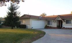 Charming West Covina Home with nice curb appeal. Floor plan offers an extra spacious living room with fireplace and laminate wood flooring. Bright open kitchen with porcelain tile flooring and a large eating area. 3 bedrooms including a master bedroom