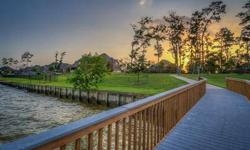 ''Summer Breeze makes me feel fine'' is what you'll be singing when you take the short walk from your 1/3 ACRE LOT to the LAKE HOUSTON SHORE! This stunning 2-story luxury home is ABSOLUTELY LOADED-- 3-CAR GARAGE, rich hardwood floors, HUGE LUXURY ISLAND
