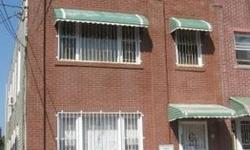 Huge solid brick Multi-Family Town House with 3 units. Can be delivered vacant. Driveway parking. Close to schools, shops and all transportation. All units have 1 bath, living room and eat in Kitchen. 1st floor has a 3 bedroom apartment. 2nd floor has 2