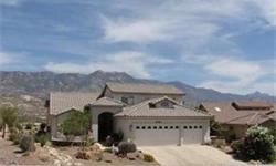 Sweeping mountain views from one of the highest points in Saddlebrooke. Huge exended patio for entertaining or just kicking back. Custom tile work throughout this lovely Galleria model and remodeled master bathroom with snail shower. Enjoy the fine life