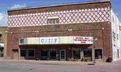 Curtain Rising - Beautiful brick building in Cloquet's original downtown. Previously know by many as the "Chief Theatre". "Now Playing" is the Homefront Cafe & Antiques. The building itself has been creatively restored with exposed massive beams and