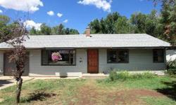 Prime location on quiet cul-de-sac with Junction creek frontage in town Durango, large lot and nice big backyard. Beautiful wood floors and updated kitchenand windows. Travertine tile in kitchen, Saltillo tile in bathroom and nicely tiled sink and bath