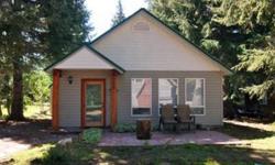 Cozy Cabin remodeled in 2001 features vaulted ceilings, propane fireplace, open floor plan, lake views, access to beach, and private 6 member dock association.Listing originally posted at http
