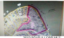 This tract of lake front land slopes to the lake and is ideal for building homes next to the water. It has been divided into 6 lake front lots, by a survey company, plus 2 large second tier lots. This preliminary drawing has not been recorded and new