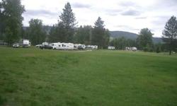 Recreational Paradise, Over 900 feet of the Coeur d' Alene River frontage, 8.1 acres 20 -RV space with hook-ups, 10 camp sites Route of the Coeur d' Alene bike trail adjacent to property, with a manufactured home with 30x40 shop, easy access to interstate