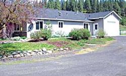 Spokane, Washington. Quality built 2005 home on 3.8 acres with year round creek. Home