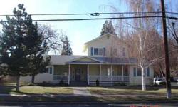 Stately home located in uptown Susanville. Features formal entry, den with full wall to wall book case, dining room and/or family room off the spacious kitchen with alder cabinets, pantry and center cook island. Covered front porch, large deck and cover