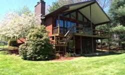 Seize this rare opportunity to purchase a home in the Chautauqua Shores community. This home is a short walk to the Chautauqua Institution. The home features a view of Chautauqua lake and docking on the association dock. This home features a large great