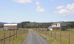 PINE GROVE GENTLEMANS FARM with 2005 stick built home. Home has vaulted entry, open kitchen/dining room, 3 bedrooms upstairs. Wrap around deck on 3 sides. Mt. Hood view. Fully fenced currently farm use is cattle & horses. 36x48 pole barn with partial