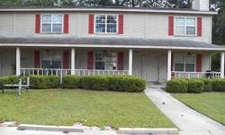 Townhouse offers a covered front porch, assigned parking, spacious living room, kitchen w/ceramic tile floors, and spacious bedrooms. Located just south of E. Park Avenue, this home offers quick and easy access to Vallotton Park and Valdosta State!Listing
