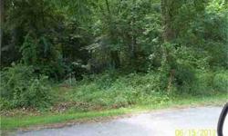 Beautiful wooded lot in Woodridge subdivision. Contact agent for plat and restrictions. Approx 2.72 acres with paved road frontage, price includes water tap.Listing originally posted at http