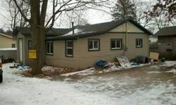 This could make a nice summer cottage or year round home by Turk Lake. Some wooden ceilings, spacious bathroom, and a partially fenced backyard! Call for access to see the inside. Special financing is available for this property