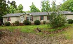 Large mobile home with a permanent foundation on a very private lot. This home is close to Easley or Greenville. This home is waiting for your touches to make it yours. Please verify all information you deem important. This property is sold "As Is" with
