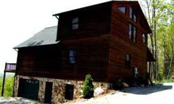 This Rustic Mountain Chalet is a two bedroom, two and a half bathroom fully furnished dream home, with a gravel driveway that leads to a 2 car attached garage.Listing originally posted at http