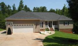 Country style living. 3 bedrooms and 3 full baths all located on main level. Carpet, tile, and hardwood floors. Kitchen has island, wall ovens, overlooks dining area and living room. Rock, gas fireplace. Bonus/Sunroom on back of home. Two car garage on