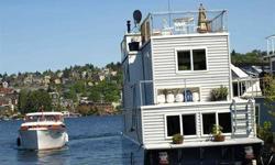 Welcome to the most amazing houseboat on the water known as "Jacob Ray". The best spot on the lake for the Fourth of July!!!! In an incredible end of dock location, watch Duck Dodge from every level, including the full upper deck with wet bar, sink and