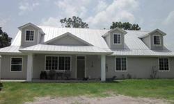 This 4 bedroom and 4 1/2 bath home was bult on 10 acres in 2003 to function as a large family home. There is a total of 3300 square feet on the 1st level and the large dormer loft upstairs. Country style kitchen with lots of room to seat up to 20 people.
