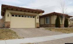 Spacious Toll Brother home located in the private gated community at Damonte Ranch. Home offers a fireplace the family room, formal dining and formal living room. Kitchen has double ovens, gas burners and large island/breakfast bar that opens up to the