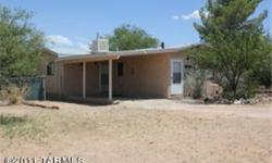 Very cute home, only 40 minutes from Tucson. 2 bedroom and 1 full bath, open kitchen with all appliances, covered patio & lots of mature mesquite trees. Single owner home and not a short sale or foreclosure. Well cared for home with fantastic mountain &