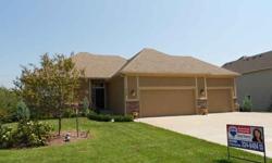 THIS HOME OFFERS A LARGE LOVELY TILE DESIGN ENTRY. ALL EARTH TONE COLORS, IMMACULATE, A PUTTING GREEN IN BACK, NOT THE USUAL OPEN FLOOR PLAN, INDIVIDUAL ROOMS PROVIDE PRIVACY & QUIETNESS. MASTER BATH OFFERS FULL BODY SHOWER & BEAUTIFUL BUILTINS, TILE