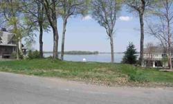 High quality, established trees, and an open lot in an upper bracket area with views of Lake Minnetonka. Bring your builder or allow us to suggest one. Adjacent 1 acre + lot is also available for a potential 2 acre + estate. Walk to Howards Point Marina.