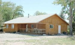 Call quick on this beautiful home and lush irrigated acreage with 1900 water rights. The home has a open floor plan with lots of upgrades. The property has big trees, superior set a pipe corrals with 9 pens, a loading chute, and automatic waterers. Horse