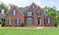 CUSTOM Full Brick home on most desirable street in neighborhood! Stunning floorplan w/cathedral ceilings & wrought iron railings. Fabulous kitchen w/Glazed maple cabinets, Granite, Stainless & Gas cooktop. Master Suite on Main Level w/trey ceiling &