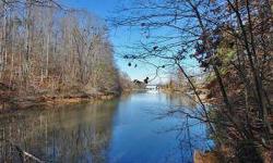 Unrestricted Lakefront 9.7 acres with approx. 530' of WF. Property has previous subdivision plan that is approved by the county. Have your own lake farm and have the best of both worlds. Lots of hardwoods, Very private,Listing originally posted at http