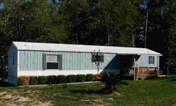Great full time or weekend getaway home in gated Harbor Point. Has covered concrete patio and 2 covered decks to enjoy the landscaped yard. Has two 7x7 storage sheds and a 12x8 portable building. Backs up to a creek that has been bulkheaded. Amazing