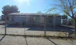 3BD/2BA mfr HUD home in Shamrock Manor on Tucson's west side. Open floorplan, vaulted ceilings. Spacious kitchen with plenty of cabinet space and an island which opens to dining area. All bedrooms have walk-in closets. Ceiling fans throughout. Covered