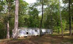 Huge corner lot, 2.4 acres, close to all Pickwick has to offer. Manufactured home can be a fixer upper or build your own weekend place on this great piece of land! Priced to sell!
Listing originally posted at http
