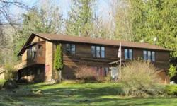 Private park like setting. Well priced home on 5.0 acres. 4+ bedrooms, 3.5 baths, 3600 +/- square feet. Huge master suite, extra large shop and garage.Great view of Mt. Baker. 2 stories with 2 living areas; mother-in-law living at it's finest. Nice and