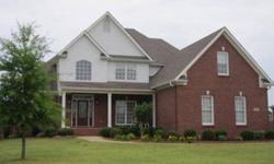 Beautiful Brick Two-Story Home with Fabulous Floor Plan. The 2-Story Foyer Welcomes you with Staircase, and Hardwoods opens to inviting Dining Room and Great Room with Beautiful Fireplace, Hardwood Floors, Crown Moulding, Ceiling Fan, and Access to