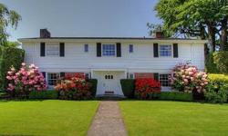 Stately Colonial, meticulously updated to retain this home's original style and grace, anchored in the core of Enumclaw's historic homes. Fantastic trim detail and extensively cared for throughout. 4,410 Sq', 4 bedrooms, 3 baths. Fully remodeled kitchen