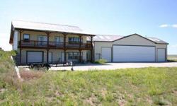 Fly into your new home in Custer County, and taxi your plane into the hangar attached to you new home. Your paved taxiway leads to common taxiway. Hangar door is 42' x 13' high, and hangar can also accommodate 2 RVs and more plus the plan. 4 bed 4 bath