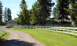 Picturesque white fencing & mature trees greets you to this great horse property. 3bd, 2 ba ranch home, extra rm for office, guests, with patio access. Lg windows takes in horses grazing area, 6 stall barn, tack rm & training arena on 5 lovely