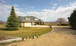 Once-in-a-lifetime fabulous estate-like home surrounded by fruit orchards and masterfully positioned to showcase stunning 180 views of the Payette River Valley and the Snake River! Formal Living Room, Dining Room, and Office. Kitchen has Sub-Zero
