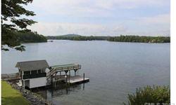 Your search for the perfect waterfront property will end when you see this fantastic point lot with gorgeous panoramic view. Large dock with sun deck, screened cabana, boat dock and lift. Manuf home in great condition with sunroom, 3BR, large deck and