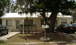 Canal Front Duplex,(1728sq.ft) 2bd/1bth Each Side, Vaulted Cieling in living,dining area. Tile Floors throughout, Central A/C & Heat. Utility Room, Covered Porch, Open Patio off dining for BBQ grill. Rented $1000.mo each side. Rentors pay all utilities.